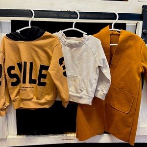 3T lot of sweaters and a long “coat”